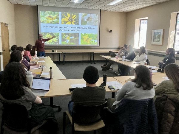 UW–Madison entomology professor Claudio Gratton talks to teachers and Field Day designers during a recent game incubator.