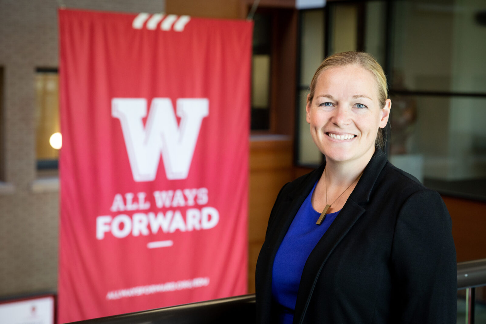 Headshot of Mollie McQuillan taken in the UW–Madison Education Building.