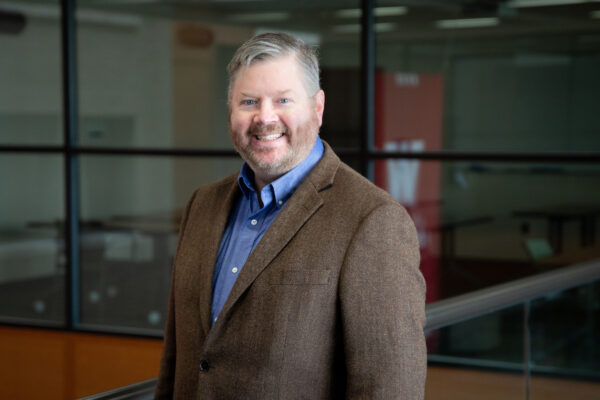 Headshot of Tim Tansey.